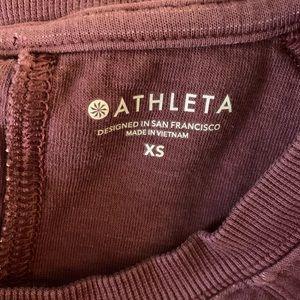 Athleta sweater. Antique burgundy/ wine color. Cute and contoured. XS.